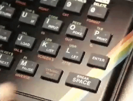 Animated ZX Spectrum keyboard with 'Enter' key highlighted - welcoming users to AI to ZX